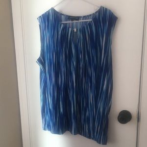 Blue and white silky sleeveless blouse
